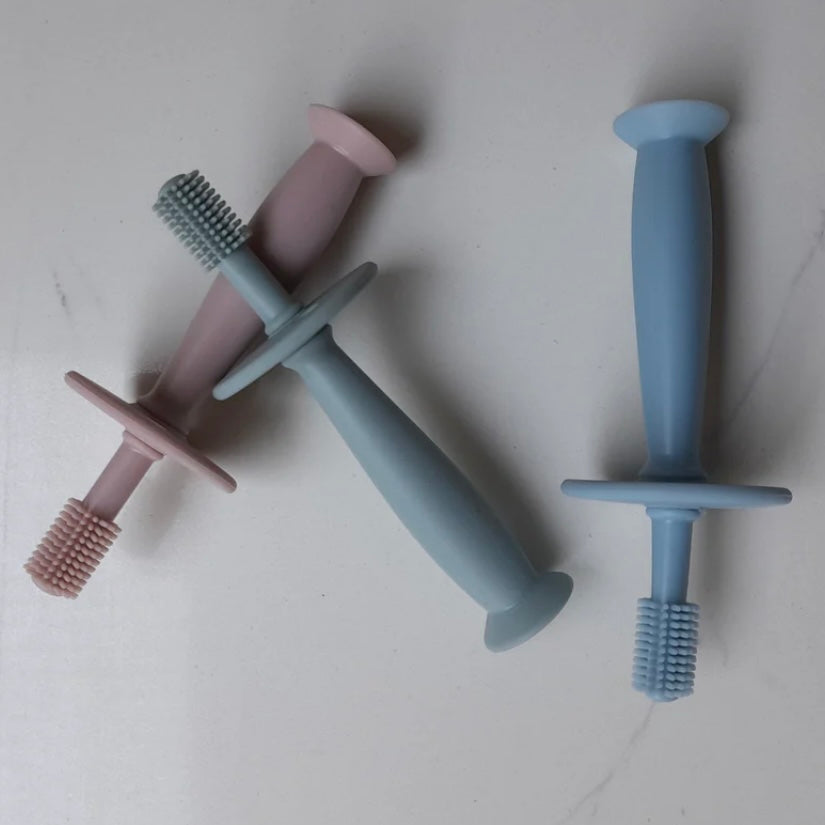 Cepillo dental / mordedera para bebé